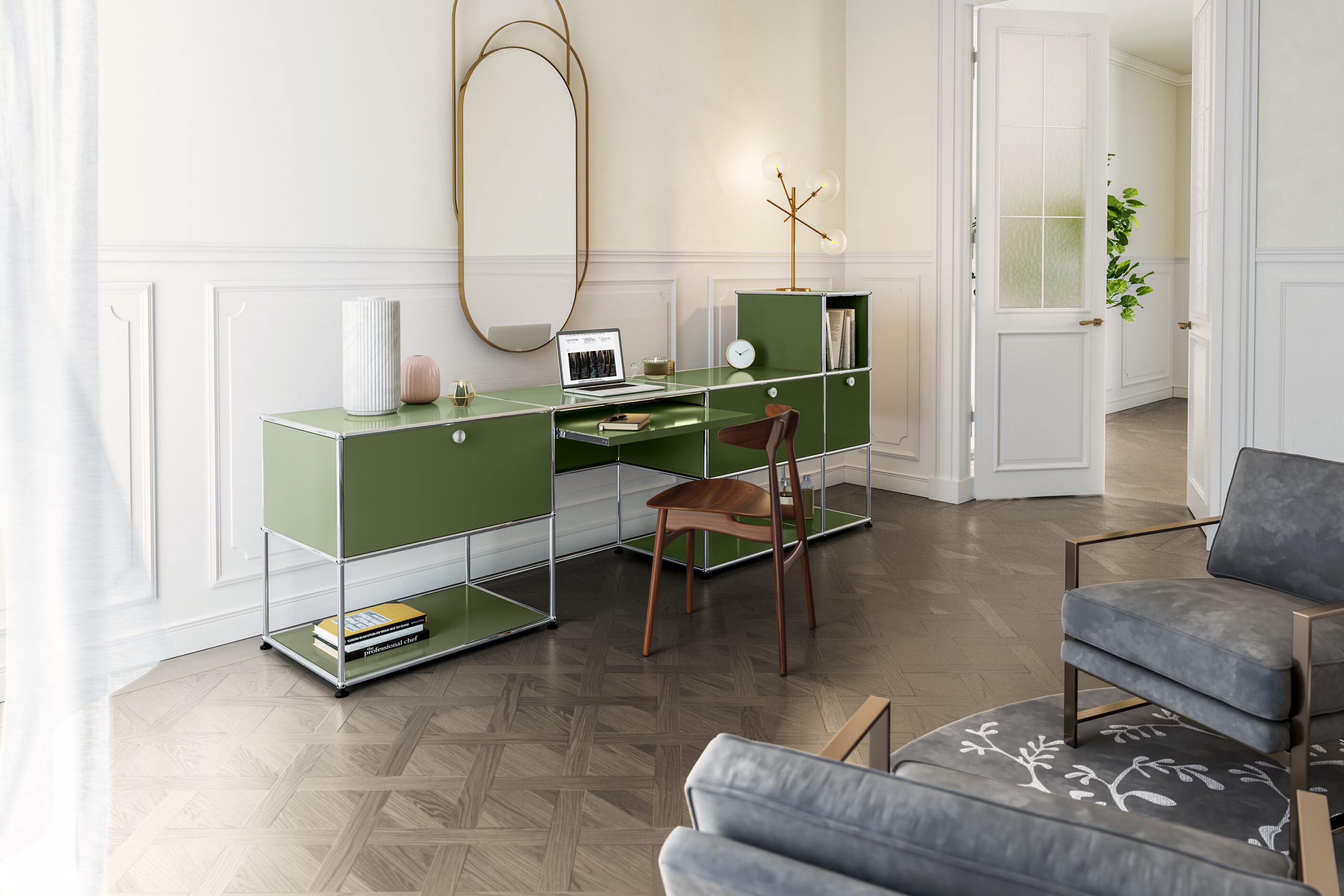 Green USM desk in a room with wood panelling on the walls and parquet flooring